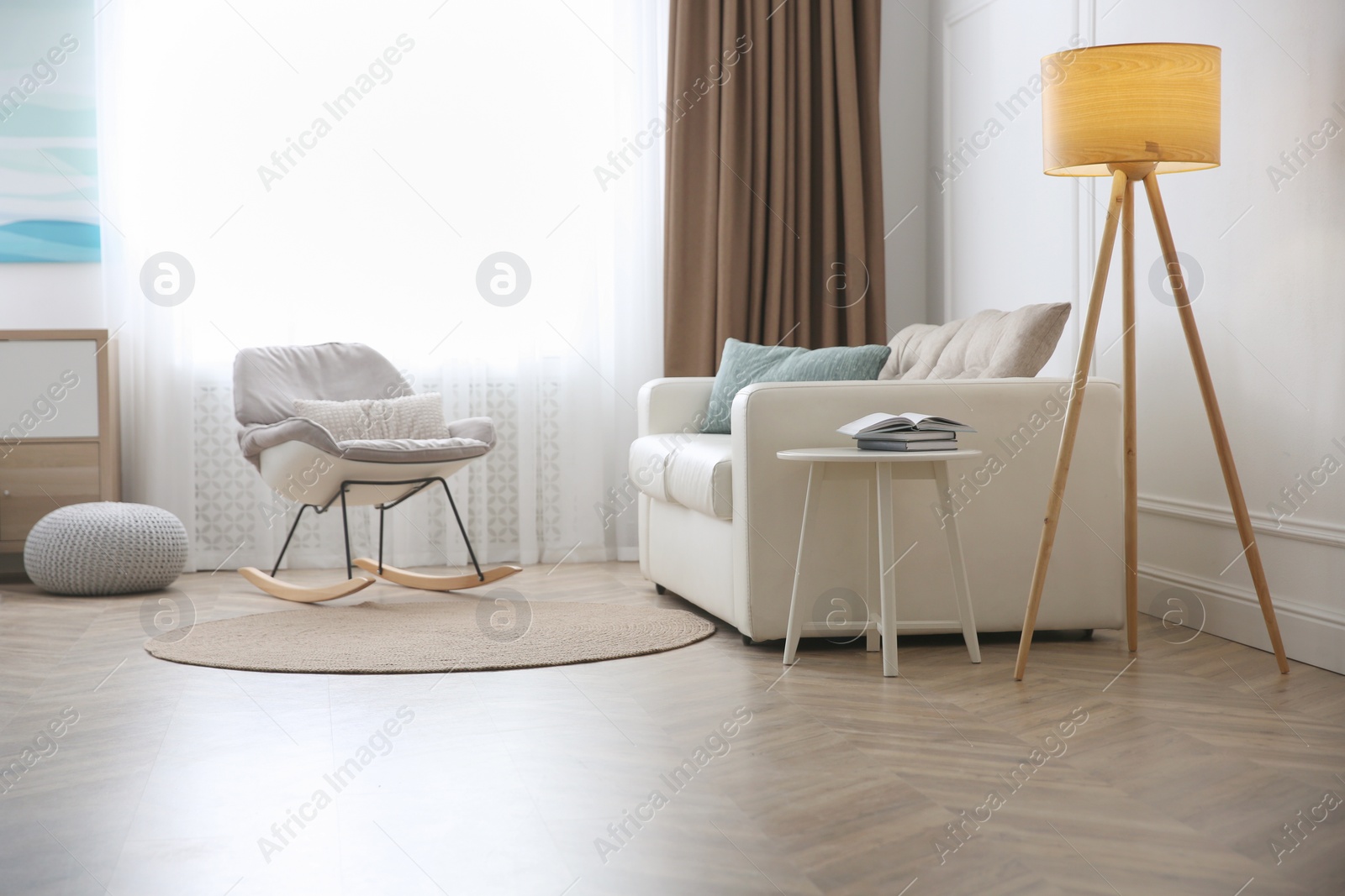 Photo of Modern living room with parquet floor and stylish furniture