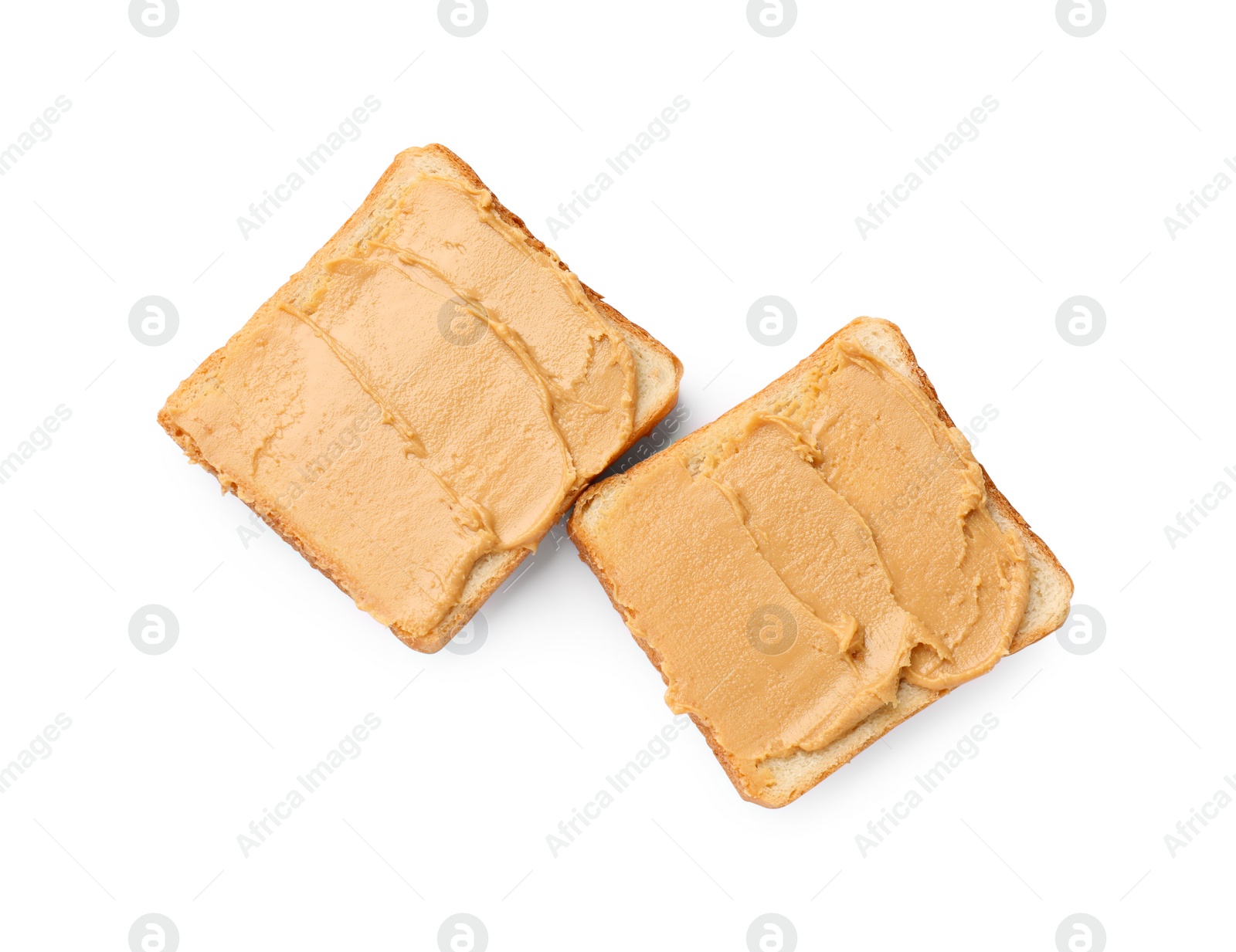 Photo of Tasty peanut butter sandwiches on white background, top view