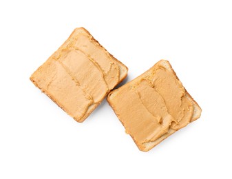 Photo of Tasty peanut butter sandwiches on white background, top view