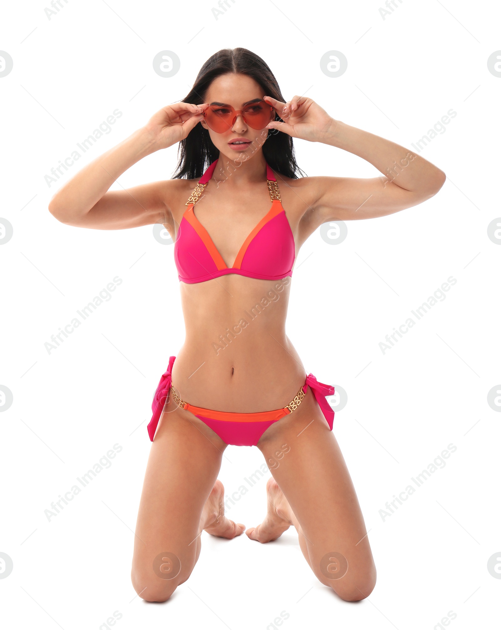 Photo of Beautiful young woman in stylish bikini with sunglasses on white background