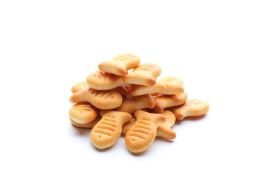 Photo of Delicious crispy goldfish crackers on white background