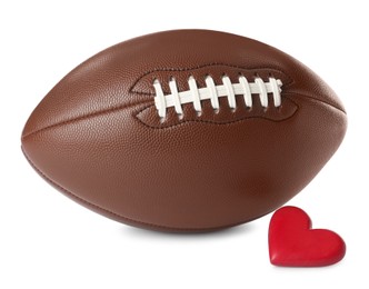 Photo of American football ball and heart on white background