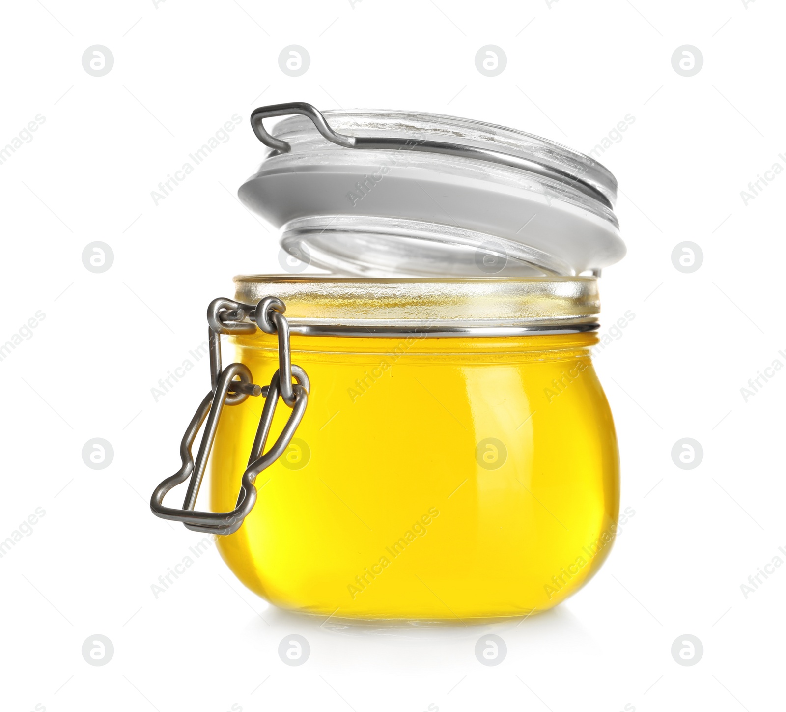 Photo of Jar with tasty jelly on white background