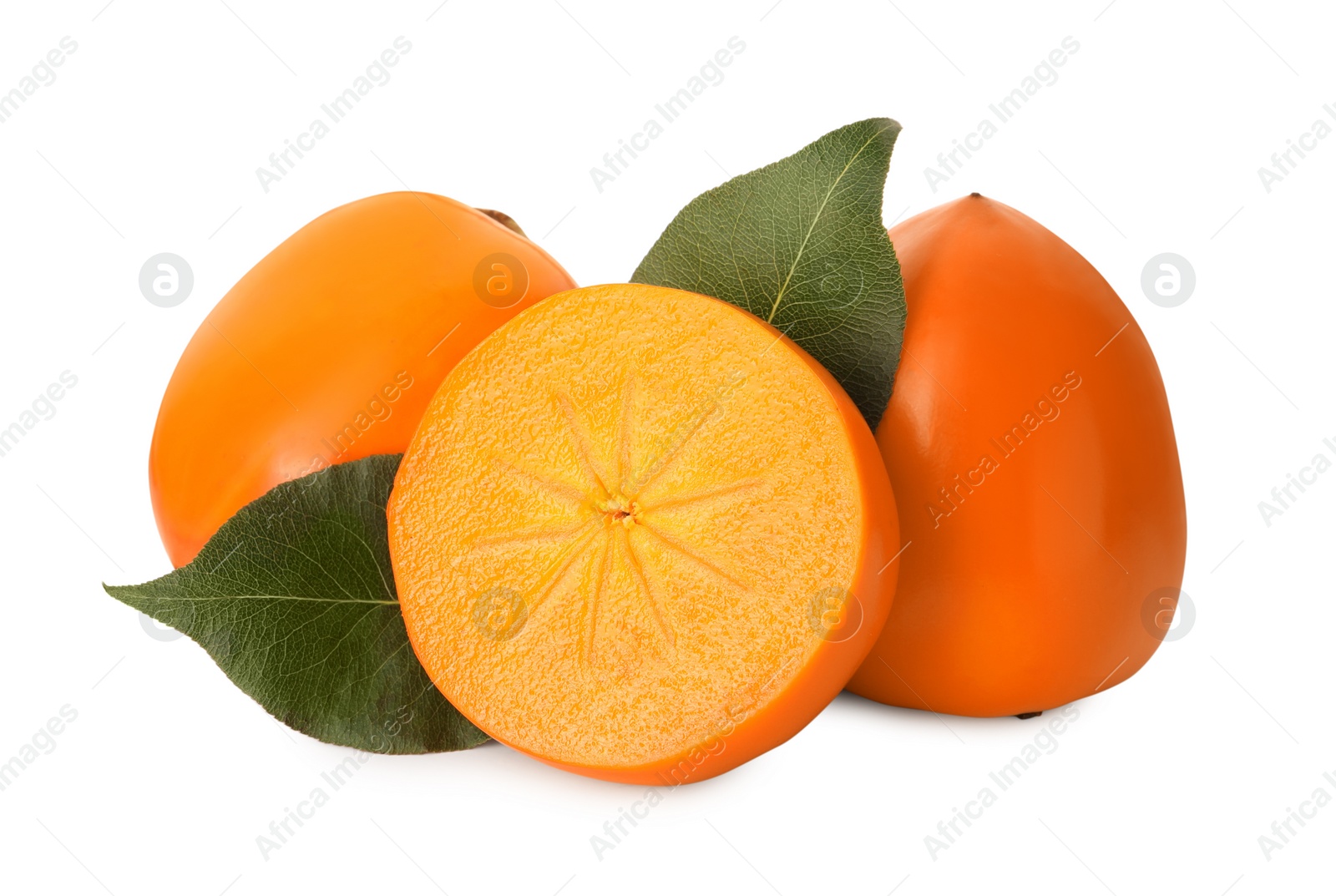 Photo of Whole and cut delicious ripe juicy persimmons on white background