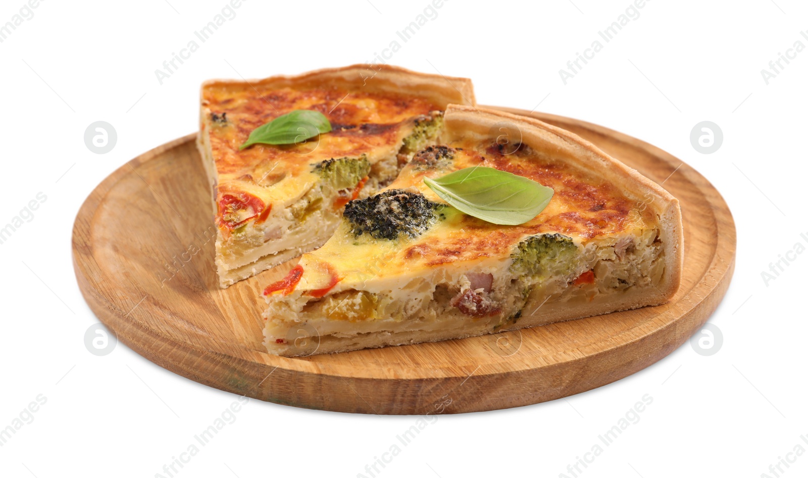 Photo of Pieces of delicious homemade vegetable quiche isolated on white