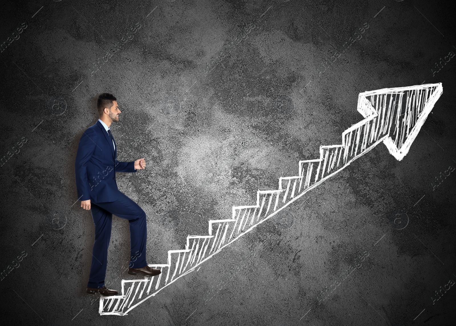 Image of Businessman walking up stairs drawing with chalk on dark background. Career ladder concept