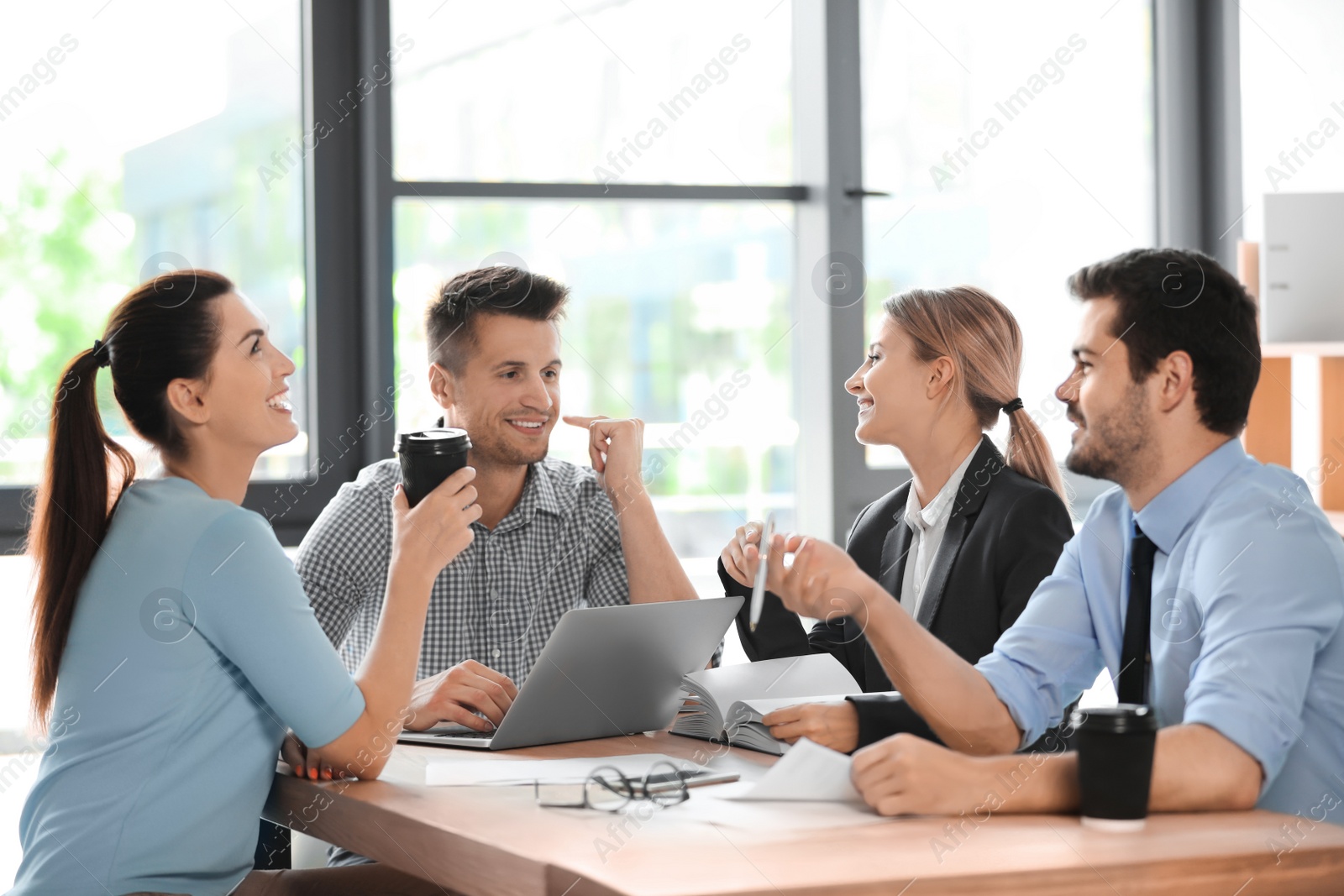 Photo of Office employees having business training at workplace