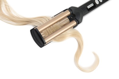 Photo of Modern triple curling iron with blonde hair lock on white background, top view