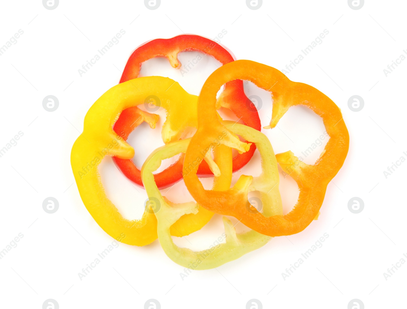 Photo of Rings of ripe bell peppers on white background, top view