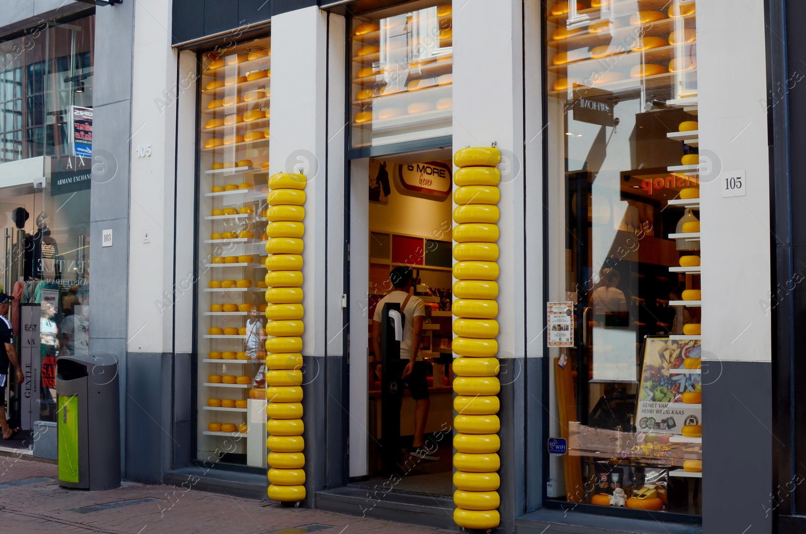 Photo of AMSTERDAM, NETHERLANDS - JULY 16, 2022: Cheese and More store on city street