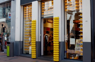 AMSTERDAM, NETHERLANDS - JULY 16, 2022: Cheese and More store on city street