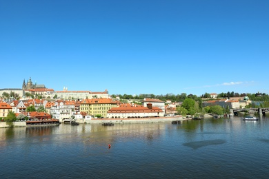 PRAGUE, CZECH REPUBLIC - APRIL 25, 2019: Cityscape with Castle complex, Saint Vitus Cathedral and Vltava river