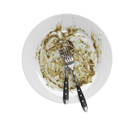 Dirty plate and cutlery on white background, top view