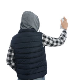 Man holding can of spray paint on white background, back view