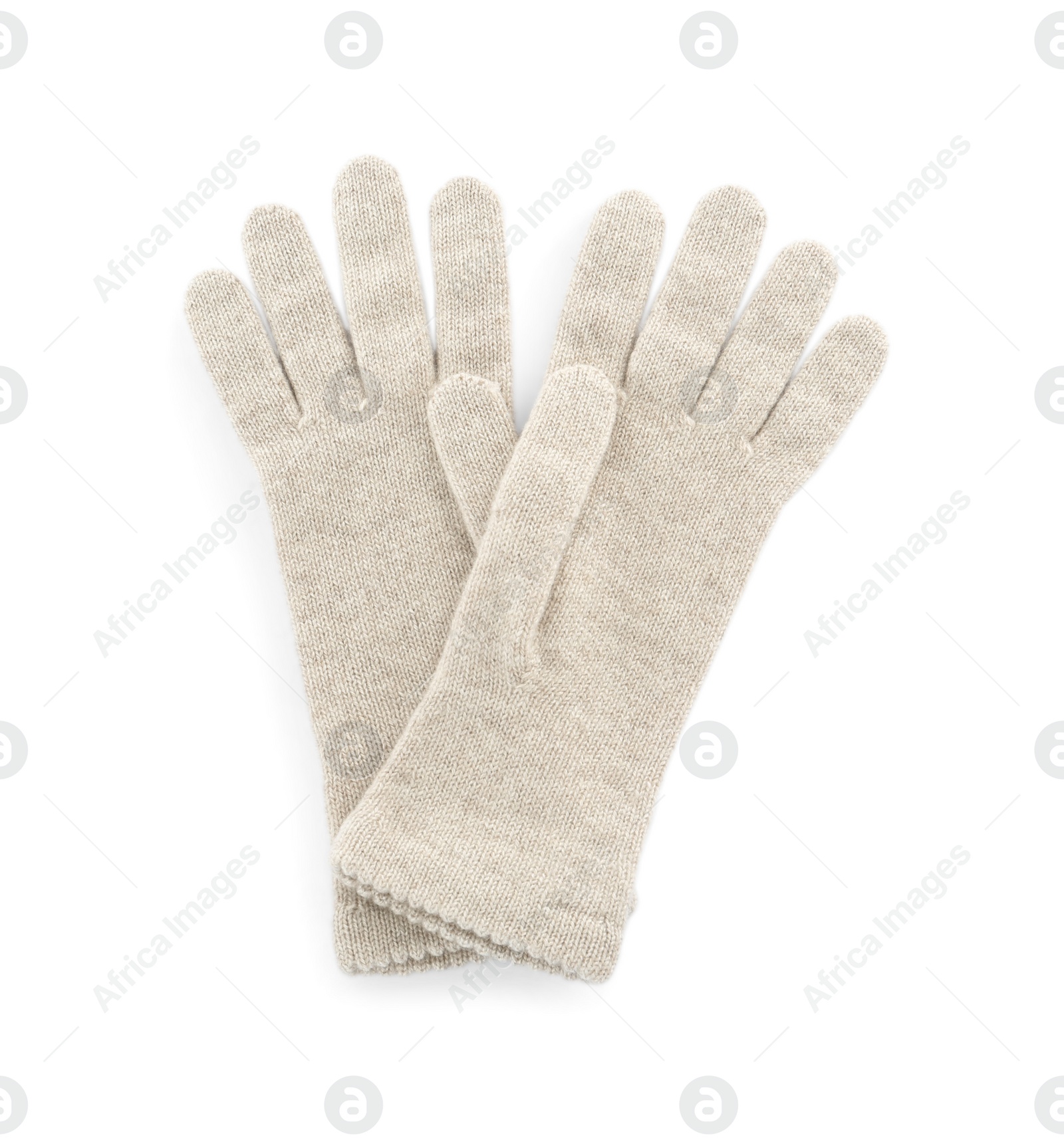 Photo of Pair of woolen gloves on white background, top view. Winter clothes