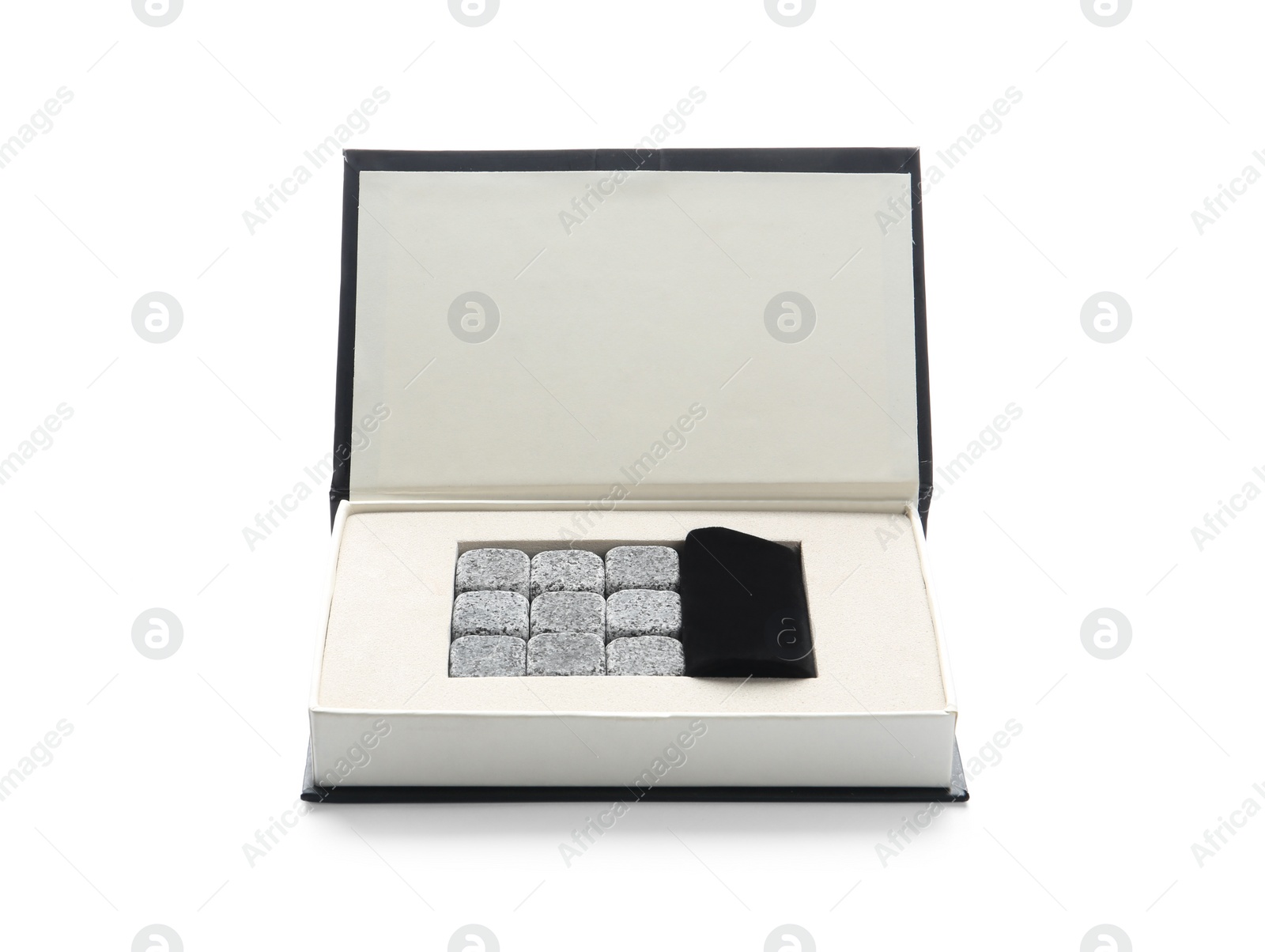 Photo of Box with whiskey stones on white background