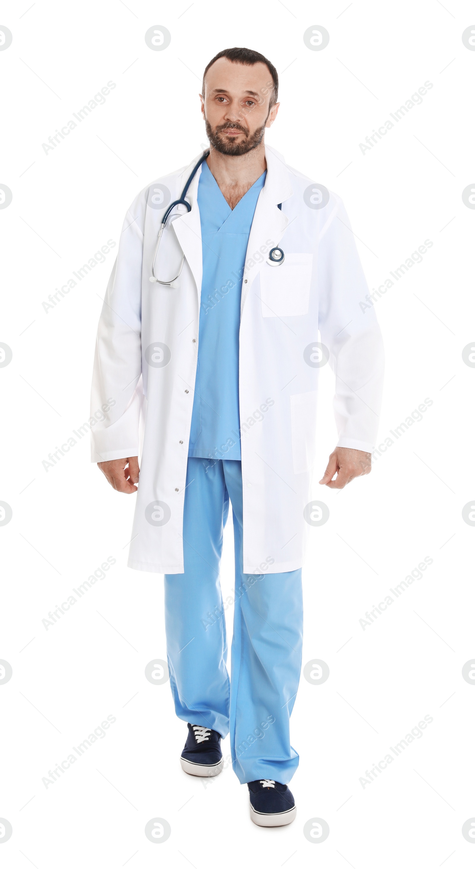 Photo of Full length portrait of male doctor isolated on white. Medical staff