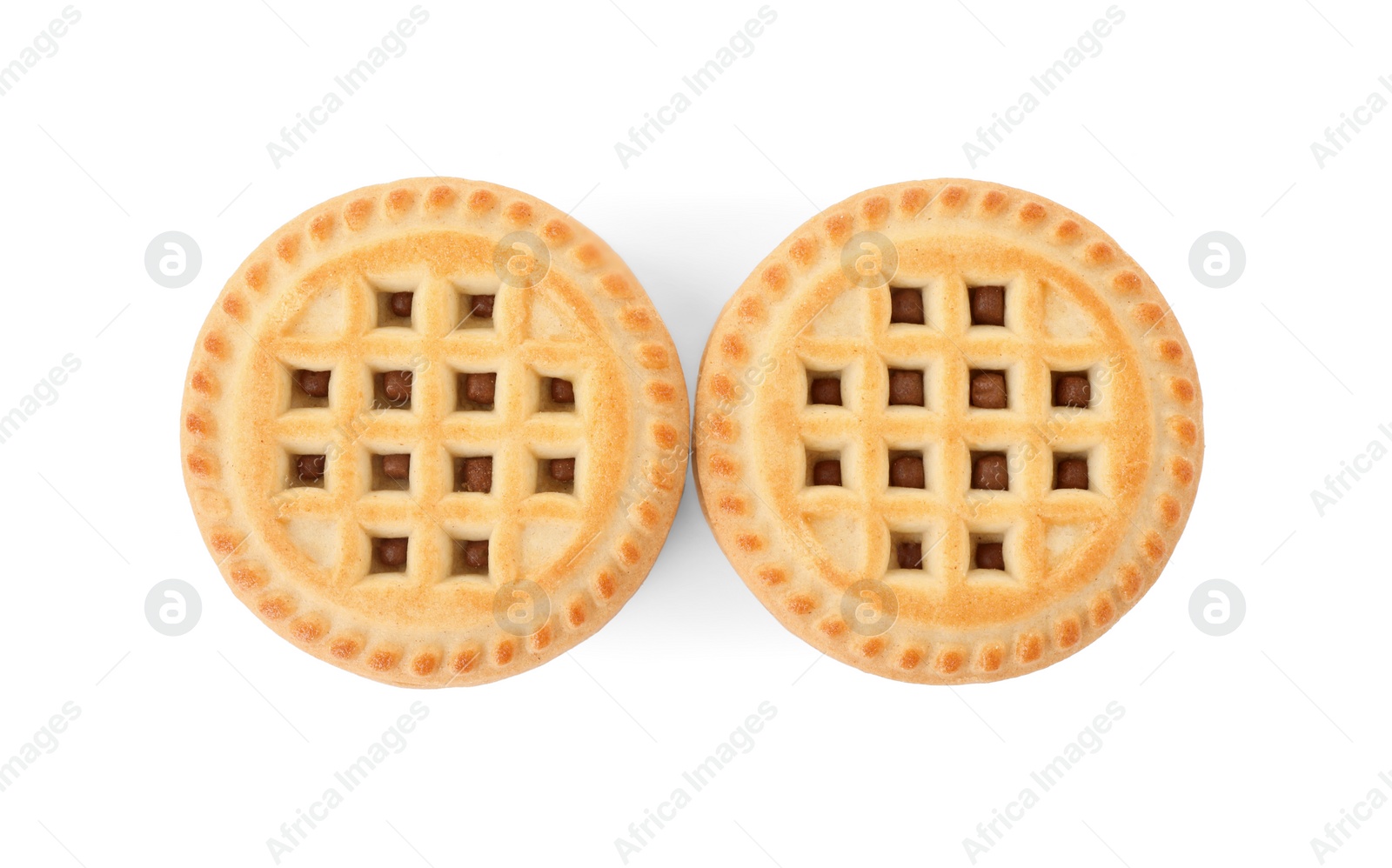 Photo of Tasty sandwich cookies with cream isolated on white, top view