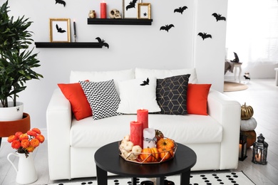 Photo of Modern room decorated for Halloween. Idea for festive interior