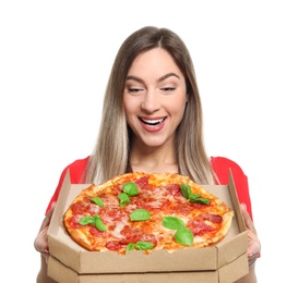 Attractive young woman with delicious pizza on white background