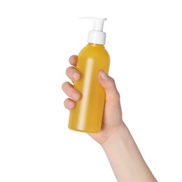 Photo of Woman holding bottle of face cleansing product on white background, closeup