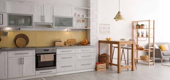 Image of Modern kitchen interior with stylish wooden table. Banner design