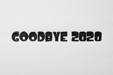 Photo of Text Goodbye 2020 written on white background