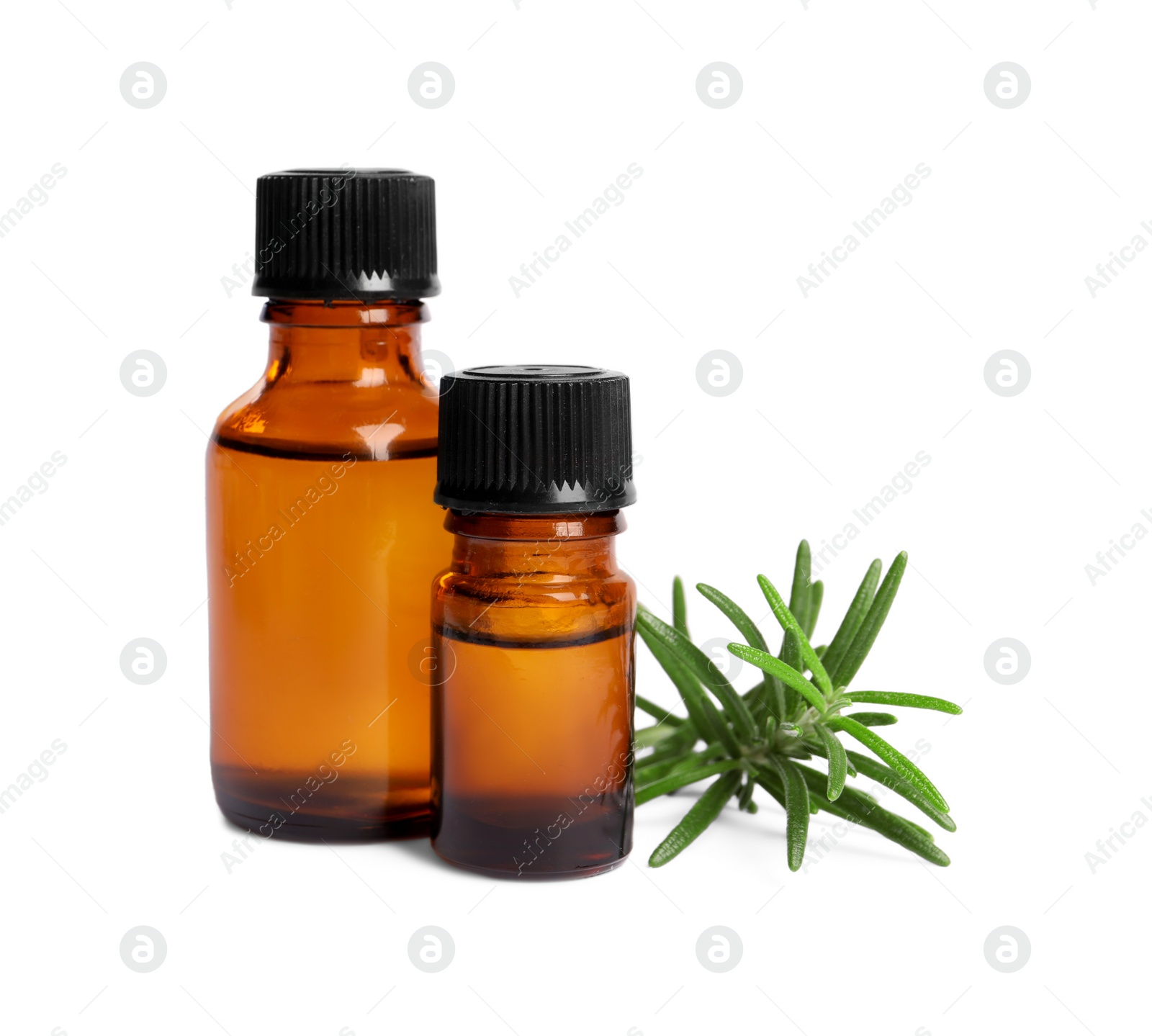 Photo of Sprig of fresh rosemary and essential oil on white background