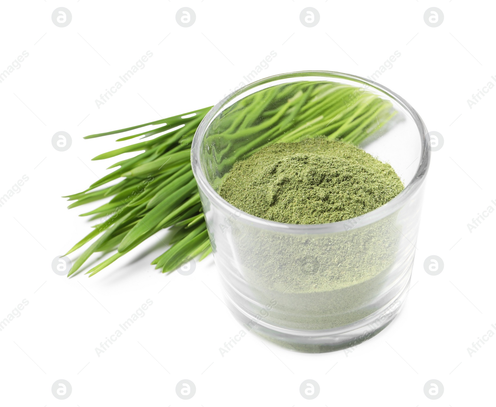 Photo of Wheat grass powder in glass and fresh sprouts isolated on white