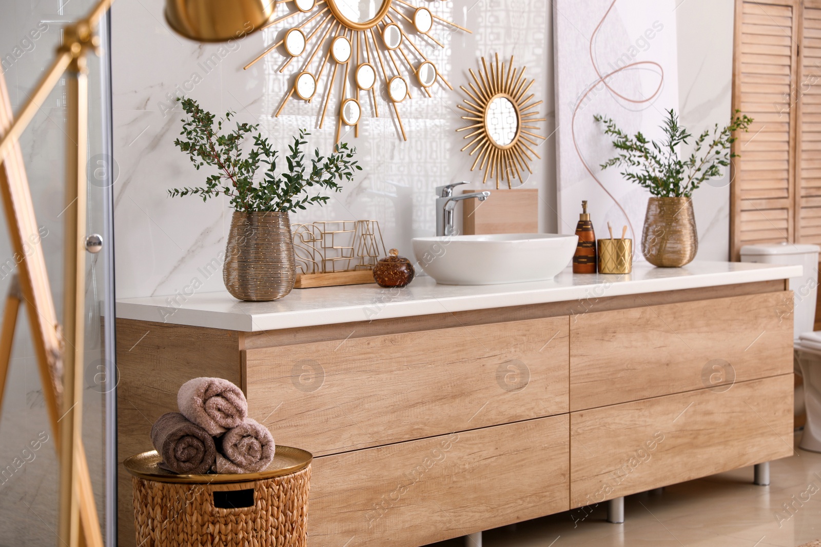 Photo of Modern bathroom interior with stylish mirror and vessel sink