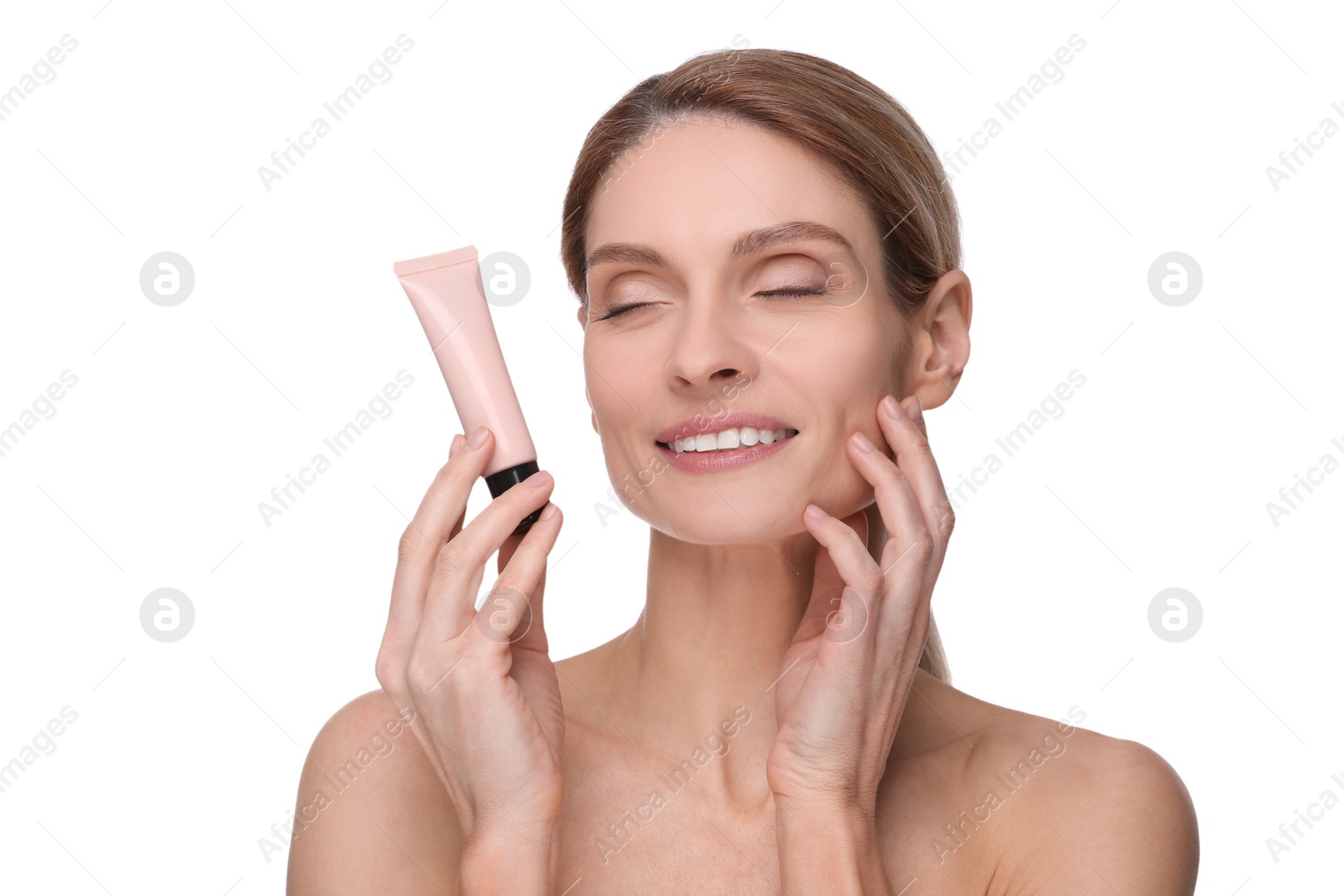 Photo of Woman holding tube with foundation on white background