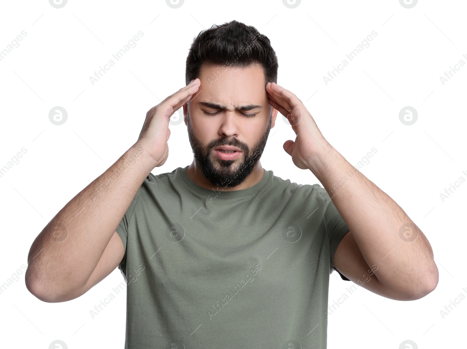 Photo of Young man suffering from headache on white background