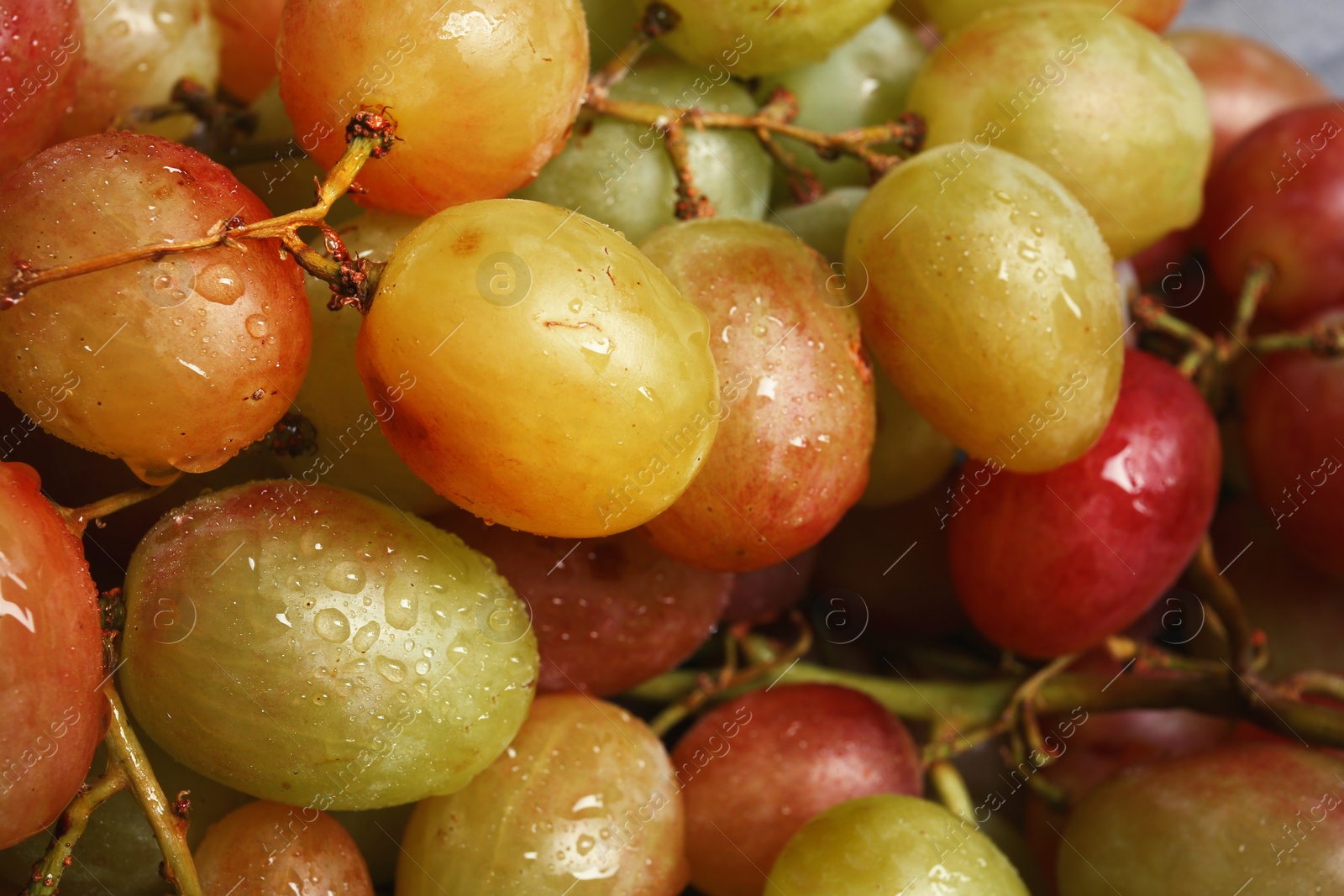 Photo of Fresh ripe juicy grapes as background, closeup