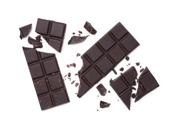 Delicious broken dark chocolate bars on white background, top view