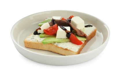 Photo of Delicious sandwich with anchovy, cheese, tomato and sauce on white background