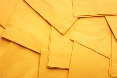 Clean paper napkins as background, top view. Personal hygiene