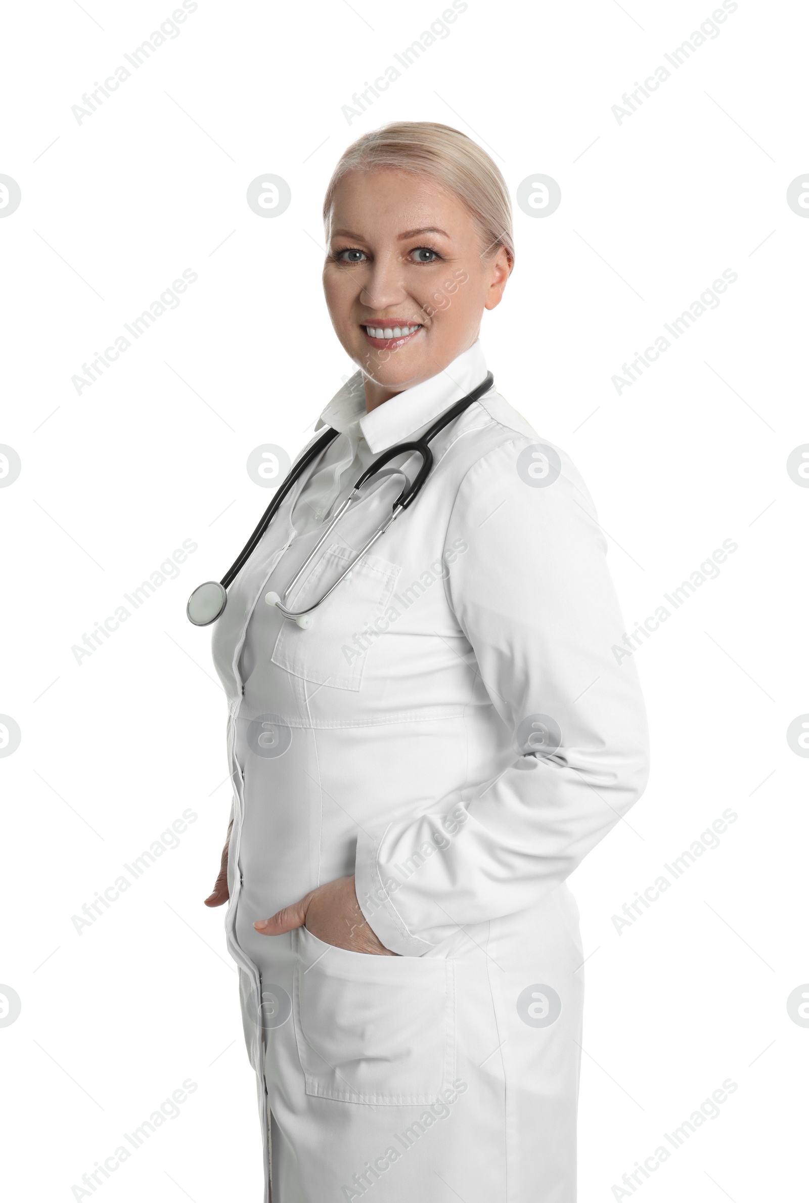 Photo of Mature doctor with stethoscope on white background