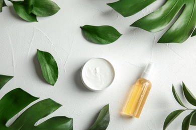 Photo of Flat lay composition with different body care products on white background