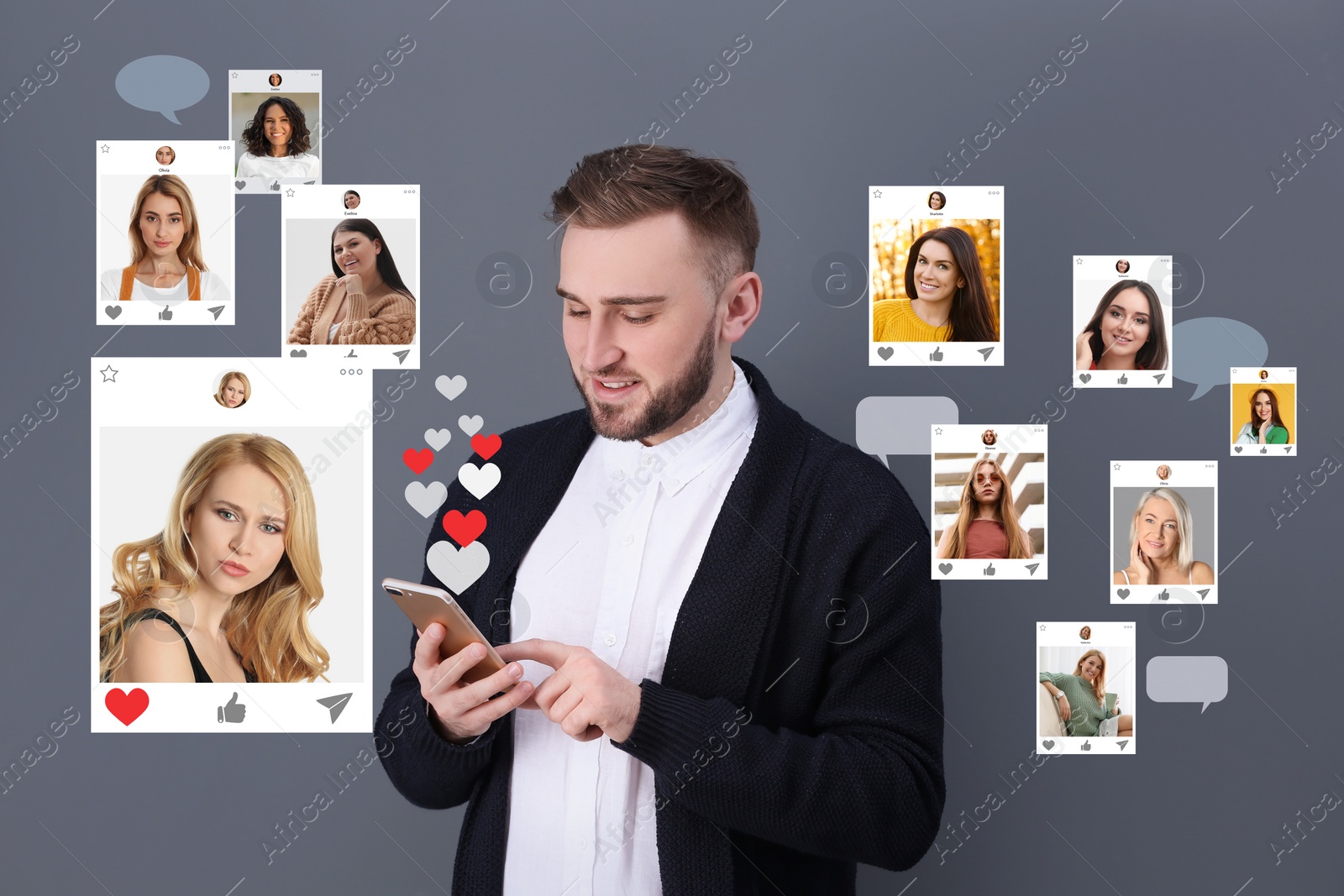 Image of Handsome man visiting online dating site via smartphone on grey background
