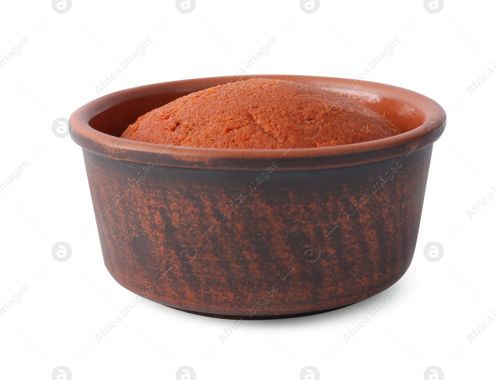 Photo of Tasty curry paste in bowl isolated on white