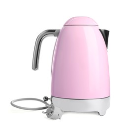 Photo of Modern pink electric kettle with base and plug isolated on white