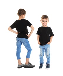 Little kids in t-shirts on white background. Mockup for design