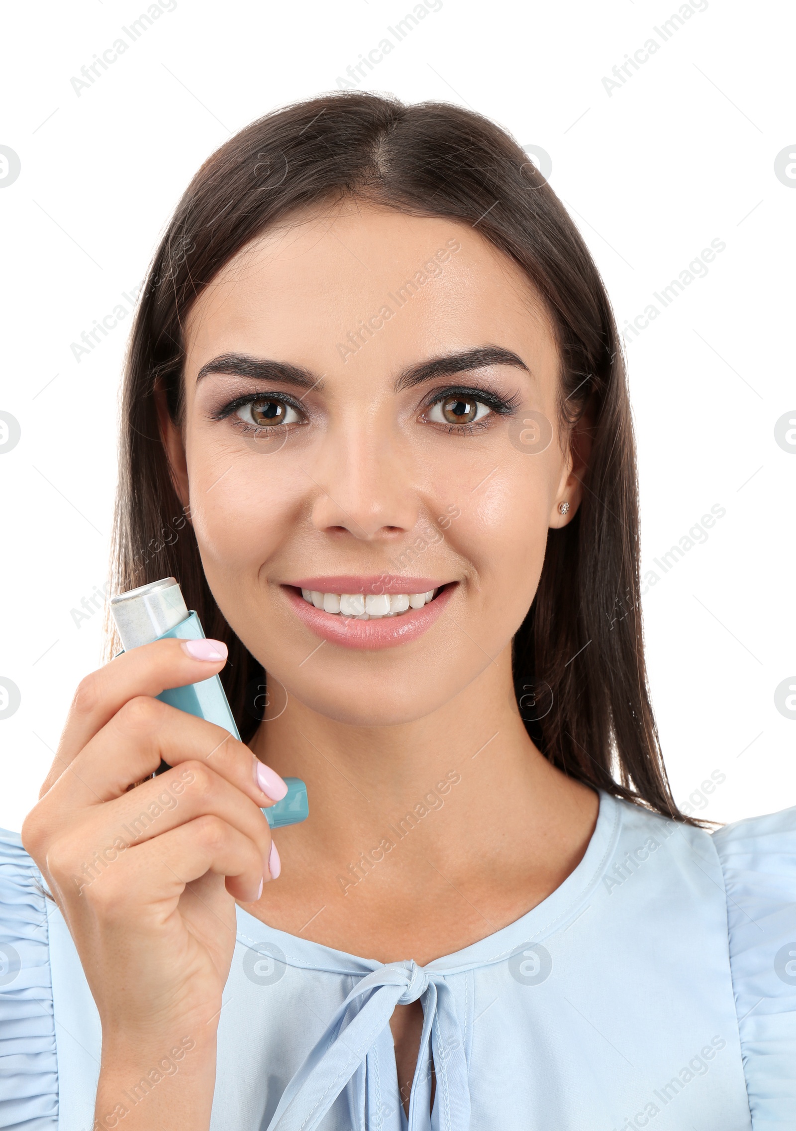 Photo of Young woman with asthma inhaler on white background