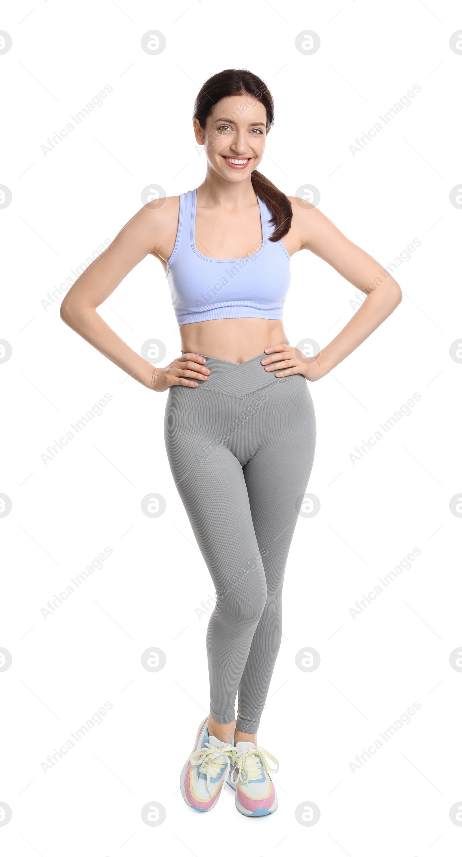 Photo of Happy young woman with slim body isolated on white