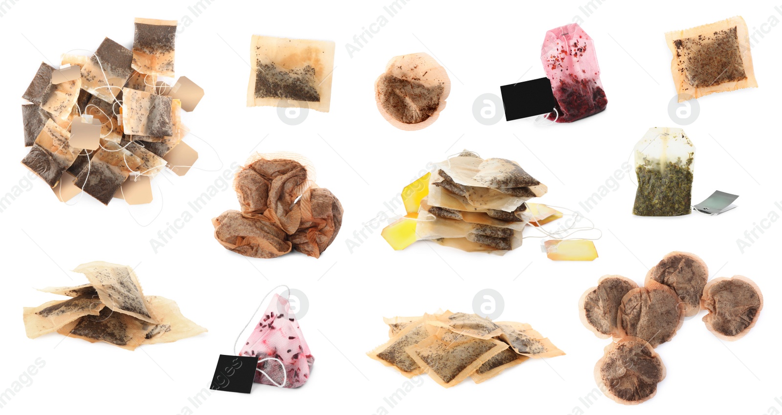 Image of Set with used tea bags on white background