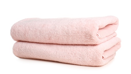 Photo of Folded soft terry towels on white background