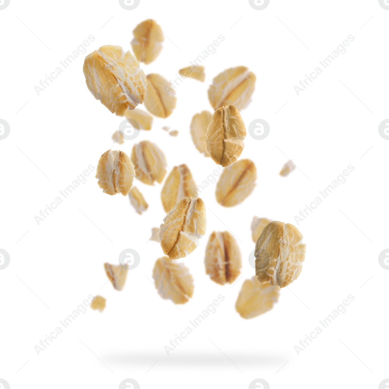 Image of Rolled oat flakes falling on white background