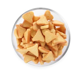 Photo of Delicious crispy rusks in glass bowl on white background, top view