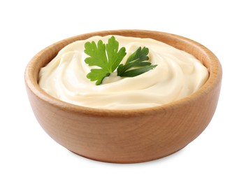 Bowl with delicious mayonnaise and parsley isolated on white