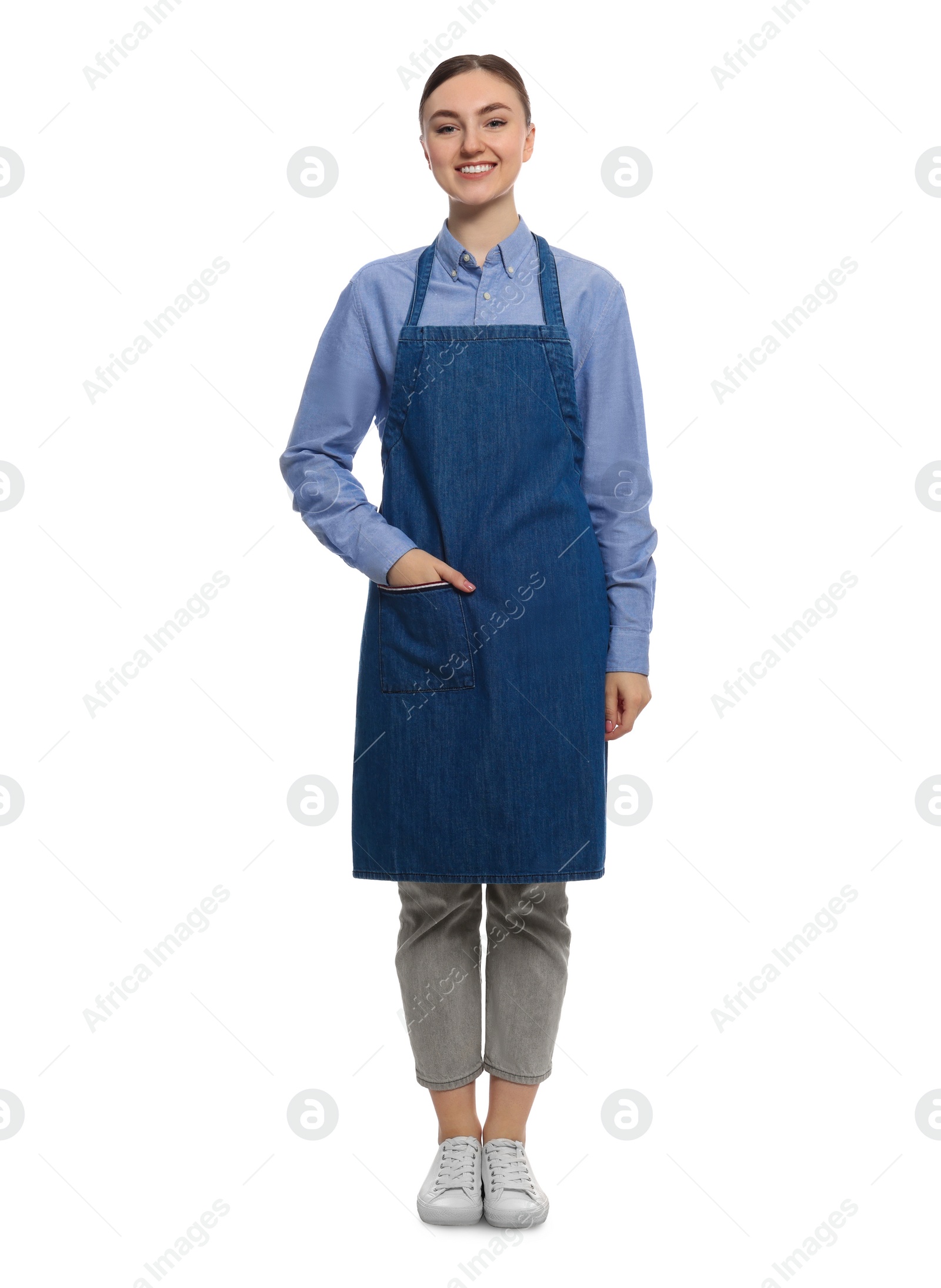 Photo of Beautiful young woman in clean denim apron on white background